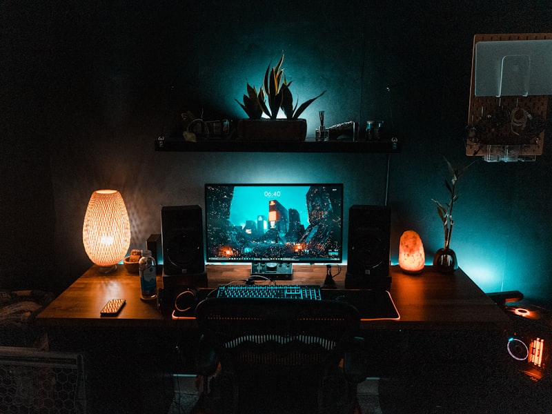 Warm-lit desk with controller and open lore notebook